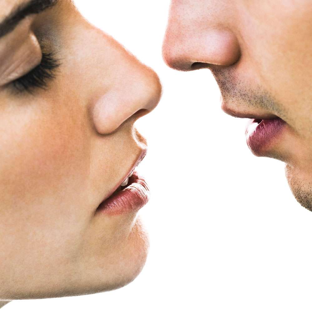 woman and man about to kiss